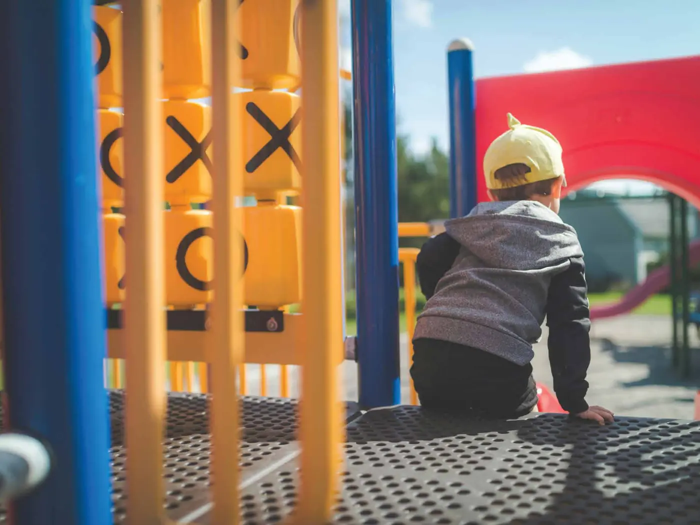 Child at the outdoor children’s play area